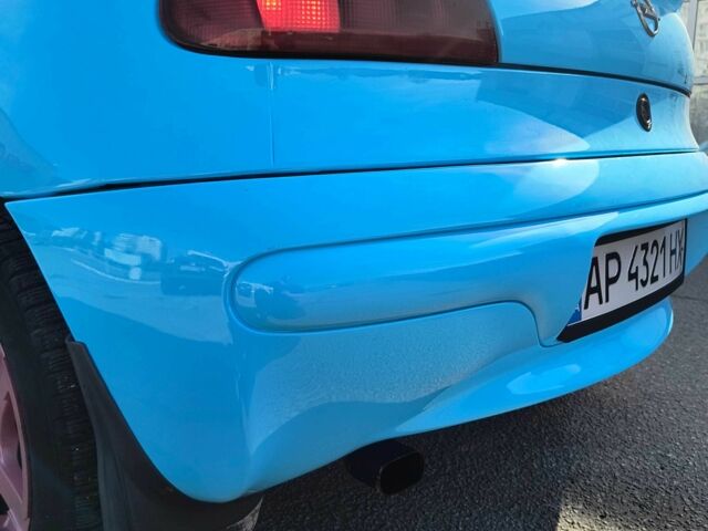 Синий Опель Тигра, объемом двигателя 1.4 л и пробегом 269 тыс. км за 2999 $, фото 14 на Automoto.ua