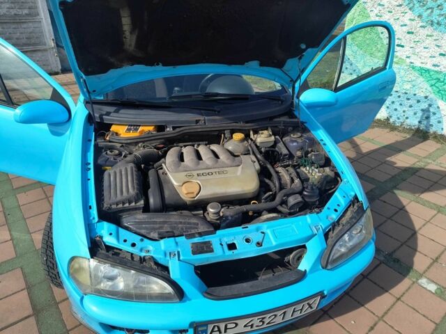 Синий Опель Тигра, объемом двигателя 1.4 л и пробегом 269 тыс. км за 2999 $, фото 10 на Automoto.ua