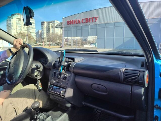 Синий Опель Тигра, объемом двигателя 1.4 л и пробегом 269 тыс. км за 2999 $, фото 15 на Automoto.ua