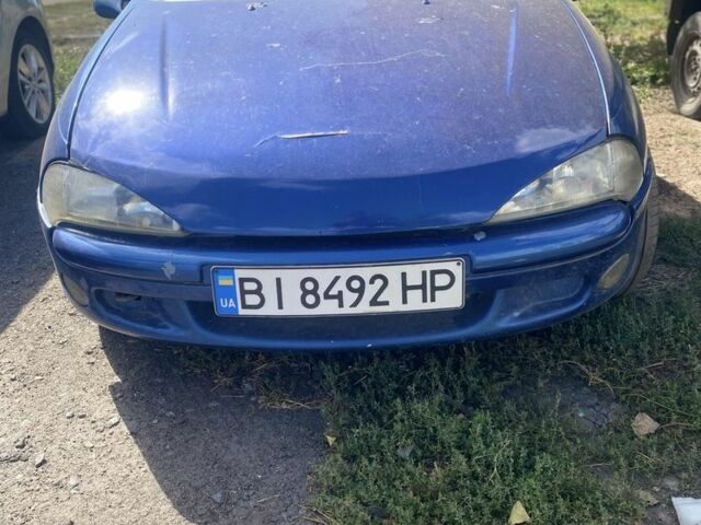 Синий Опель Тигра, объемом двигателя 1.4 л и пробегом 3 тыс. км за 1900 $, фото 1 на Automoto.ua