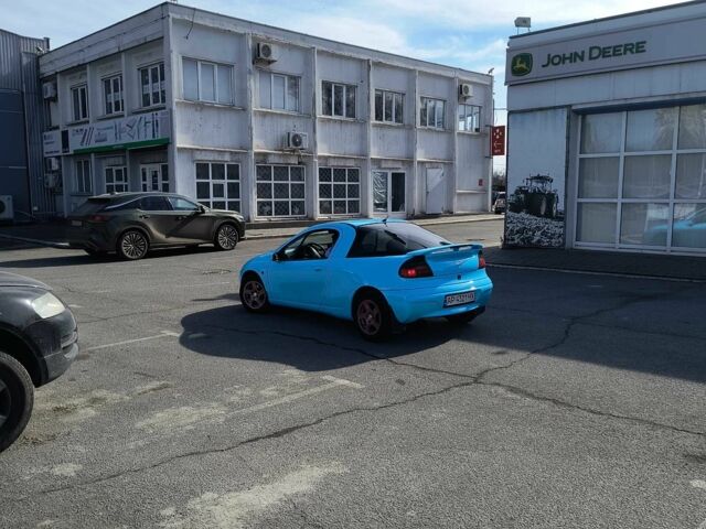 Синий Опель Тигра, объемом двигателя 1.4 л и пробегом 269 тыс. км за 2999 $, фото 12 на Automoto.ua