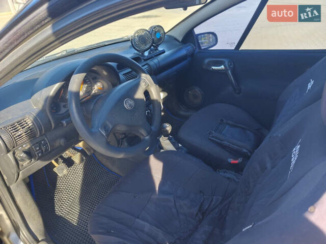 Синій Опель Тігра, об'ємом двигуна 1.4 л та пробігом 295 тис. км за 2500 $, фото 5 на Automoto.ua