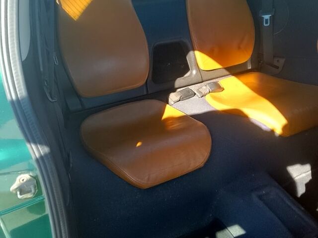 Зеленый Опель Тигра, объемом двигателя 1.4 л и пробегом 220 тыс. км за 2700 $, фото 6 на Automoto.ua