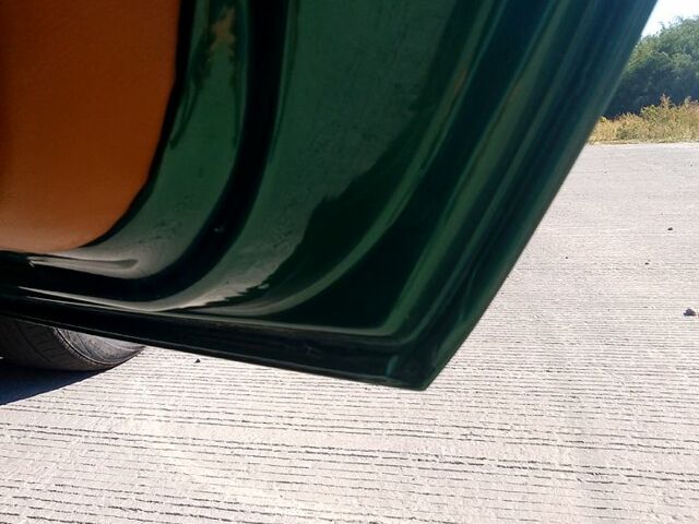 Зеленый Опель Тигра, объемом двигателя 1.4 л и пробегом 220 тыс. км за 2700 $, фото 9 на Automoto.ua