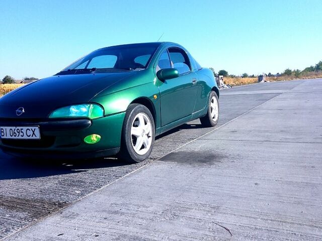 Зеленый Опель Тигра, объемом двигателя 1.4 л и пробегом 220 тыс. км за 2700 $, фото 3 на Automoto.ua