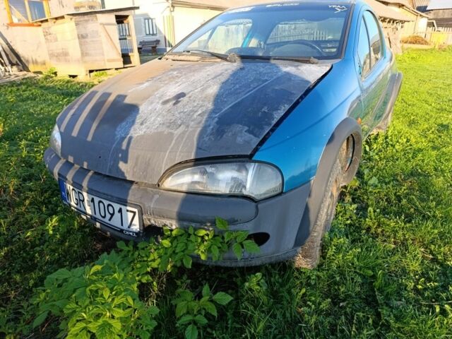 Зеленый Опель Тигра, объемом двигателя 1.4 л и пробегом 230 тыс. км за 10000 $, фото 6 на Automoto.ua