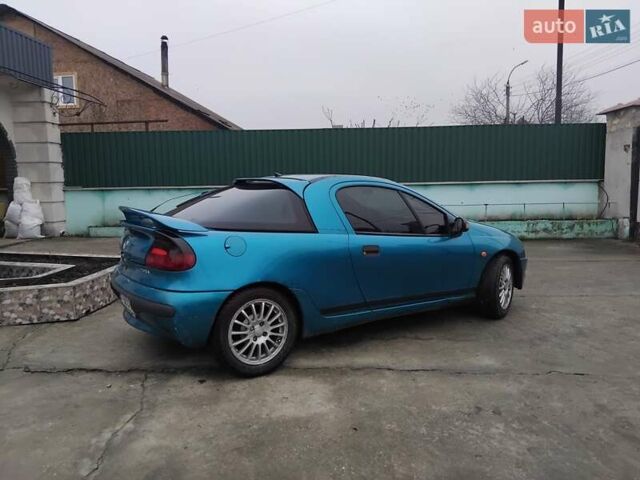 Зеленый Опель Тигра, объемом двигателя 1.6 л и пробегом 300 тыс. км за 2200 $, фото 4 на Automoto.ua