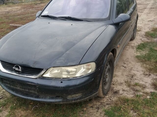 Синій Опель Вектра Б, об'ємом двигуна 2 л та пробігом 374 тис. км за 1400 $, фото 6 на Automoto.ua