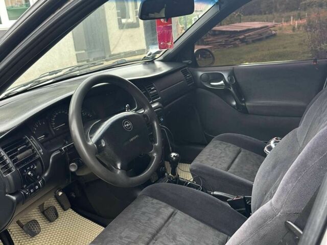 Белый Опель Вектра, объемом двигателя 2 л и пробегом 240 тыс. км за 1500 $, фото 7 на Automoto.ua