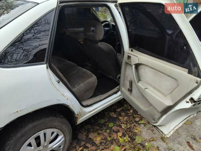 Белый Опель Вектра, объемом двигателя 2 л и пробегом 350 тыс. км за 720 $, фото 11 на Automoto.ua