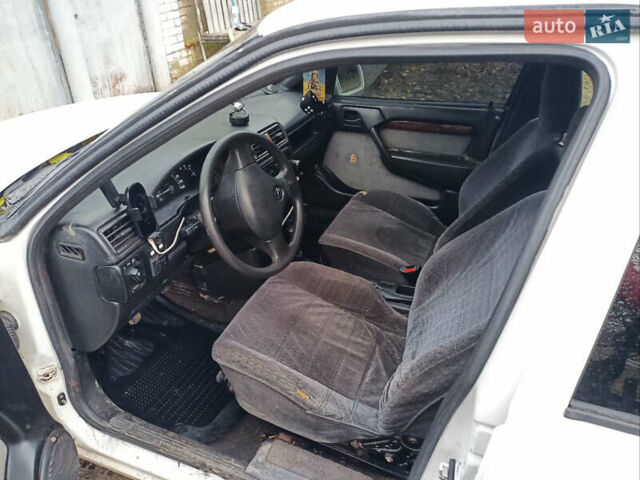 Белый Опель Вектра, объемом двигателя 2 л и пробегом 279 тыс. км за 1600 $, фото 4 на Automoto.ua