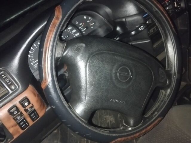 Белый Опель Вектра, объемом двигателя 0 л и пробегом 210 тыс. км за 404 $, фото 6 на Automoto.ua