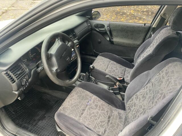 Білий Опель Вектра, об'ємом двигуна 2 л та пробігом 320 тис. км за 1800 $, фото 6 на Automoto.ua