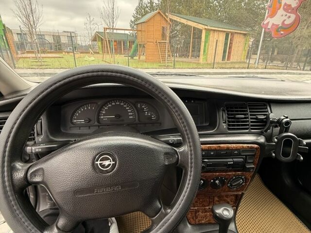 Белый Опель Вектра, объемом двигателя 1.8 л и пробегом 340 тыс. км за 3500 $, фото 4 на Automoto.ua