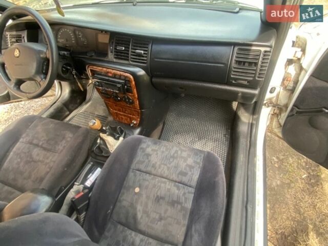 Белый Опель Вектра, объемом двигателя 1.99 л и пробегом 498 тыс. км за 1850 $, фото 18 на Automoto.ua