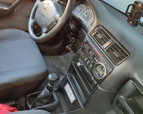 Бежевий Опель Вектра, об'ємом двигуна 2 л та пробігом 245 тис. км за 1450 $, фото 4 на Automoto.ua
