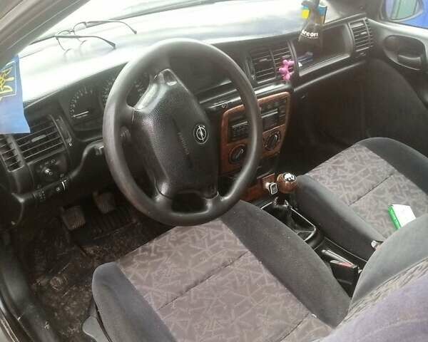 Бежевый Опель Вектра, объемом двигателя 1.6 л и пробегом 340 тыс. км за 2000 $, фото 4 на Automoto.ua