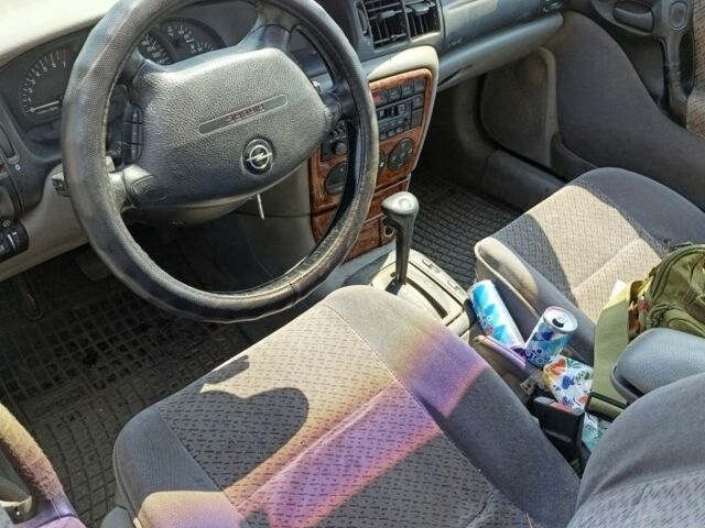 Бежевый Опель Вектра, объемом двигателя 2 л и пробегом 211 тыс. км за 1194 $, фото 3 на Automoto.ua