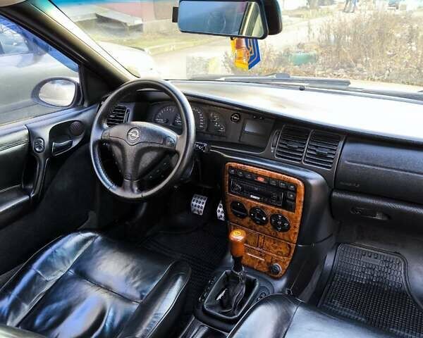 Бежевый Опель Вектра, объемом двигателя 2 л и пробегом 419 тыс. км за 3500 $, фото 18 на Automoto.ua