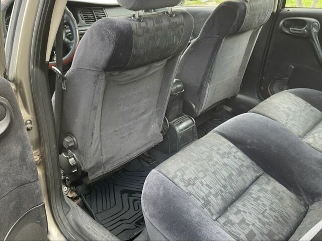 Бежевий Опель Вектра, об'ємом двигуна 2 л та пробігом 250 тис. км за 1650 $, фото 6 на Automoto.ua