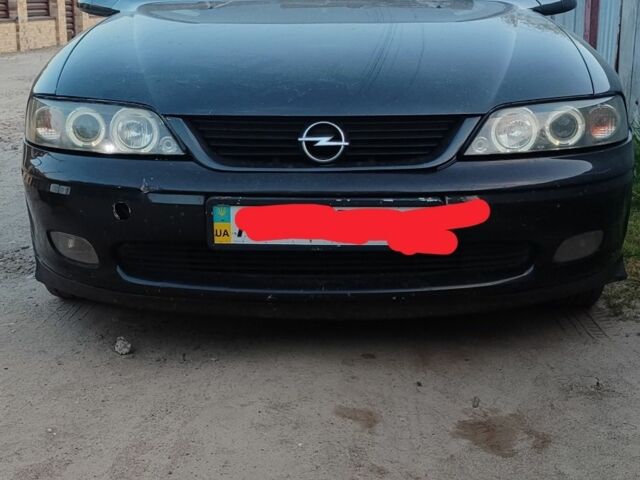 Черный Опель Вектра, объемом двигателя 1.6 л и пробегом 400 тыс. км за 1400 $, фото 5 на Automoto.ua