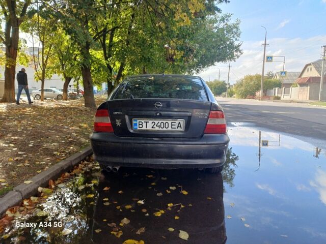 Черный Опель Вектра, объемом двигателя 2.5 л и пробегом 380 тыс. км за 3100 $, фото 1 на Automoto.ua