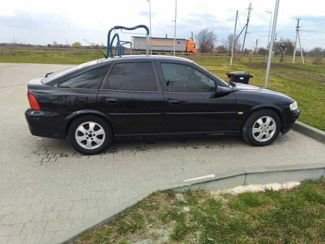 Черный Опель Вектра, объемом двигателя 2.2 л и пробегом 400 тыс. км за 3100 $, фото 11 на Automoto.ua