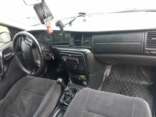 Черный Опель Вектра, объемом двигателя 2.2 л и пробегом 400 тыс. км за 3100 $, фото 21 на Automoto.ua