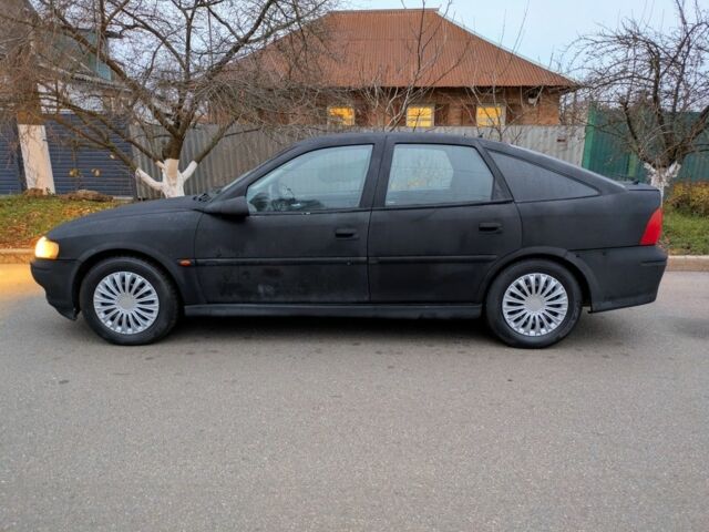 Чорний Опель Вектра, об'ємом двигуна 2 л та пробігом 301 тис. км за 1349 $, фото 5 на Automoto.ua