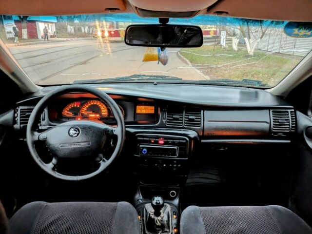 Чорний Опель Вектра, об'ємом двигуна 2 л та пробігом 301 тис. км за 1349 $, фото 9 на Automoto.ua