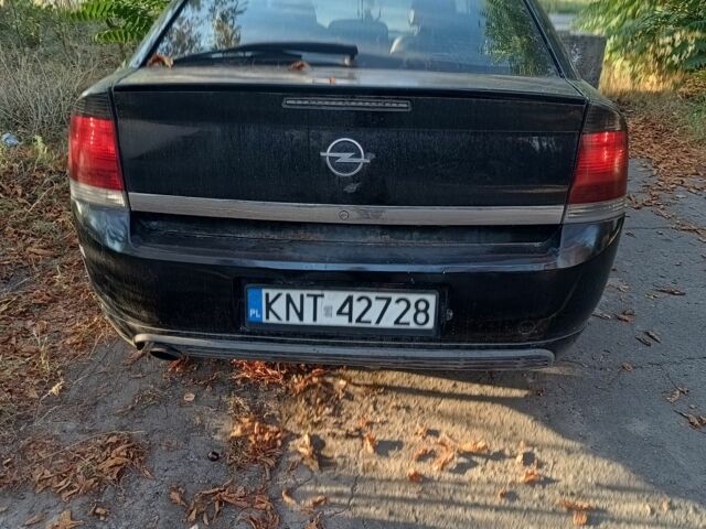 Черный Опель Вектра, объемом двигателя 2 л и пробегом 258 тыс. км за 1600 $, фото 1 на Automoto.ua