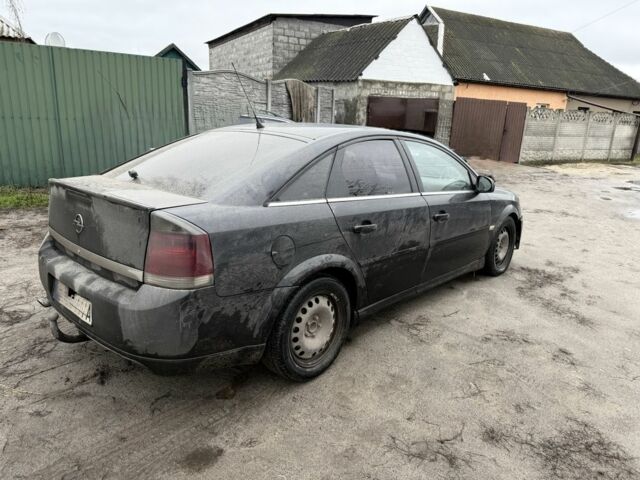 Черный Опель Вектра, объемом двигателя 1.9 л и пробегом 320 тыс. км за 825 $, фото 5 на Automoto.ua