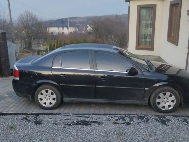 Черный Опель Вектра, объемом двигателя 2.2 л и пробегом 250 тыс. км за 3552 $, фото 2 на Automoto.ua