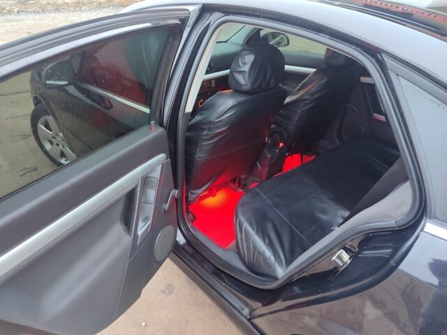 Черный Опель Вектра, объемом двигателя 2.2 л и пробегом 351 тыс. км за 3950 $, фото 5 на Automoto.ua