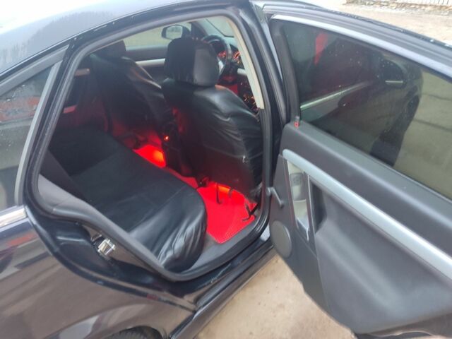 Черный Опель Вектра, объемом двигателя 2.2 л и пробегом 351 тыс. км за 3950 $, фото 6 на Automoto.ua