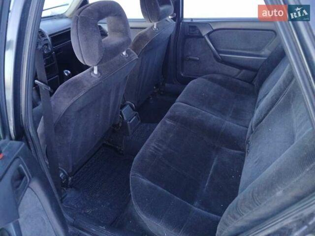 Черный Опель Вектра, объемом двигателя 2 л и пробегом 445 тыс. км за 1100 $, фото 4 на Automoto.ua