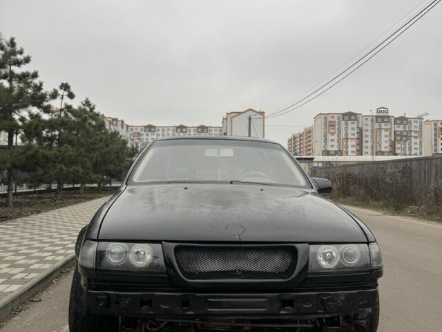 Черный Опель Вектра, объемом двигателя 2 л и пробегом 130 тыс. км за 1300 $, фото 3 на Automoto.ua