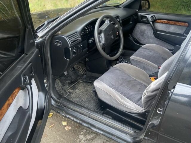 Черный Опель Вектра, объемом двигателя 2 л и пробегом 350 тыс. км за 1200 $, фото 4 на Automoto.ua