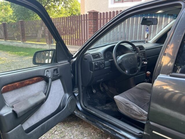 Черный Опель Вектра, объемом двигателя 2 л и пробегом 423 тыс. км за 1650 $, фото 8 на Automoto.ua