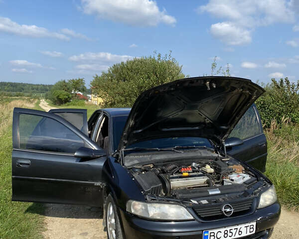 Чорний Опель Вектра, об'ємом двигуна 2 л та пробігом 474 тис. км за 2650 $, фото 13 на Automoto.ua