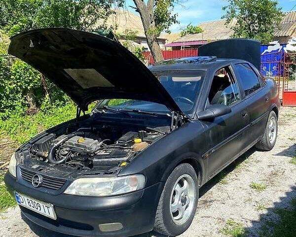 Чорний Опель Вектра, об'ємом двигуна 2 л та пробігом 410 тис. км за 1600 $, фото 2 на Automoto.ua