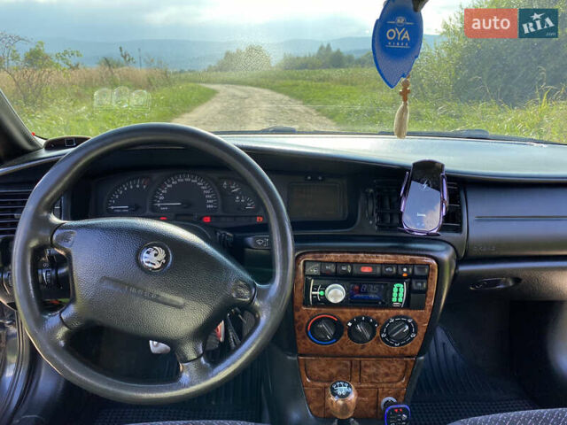 Чорний Опель Вектра, об'ємом двигуна 2 л та пробігом 474 тис. км за 2650 $, фото 11 на Automoto.ua