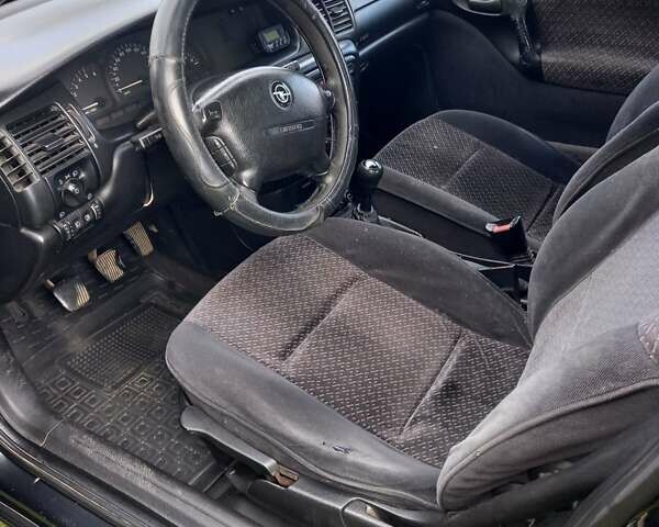 Чорний Опель Вектра, об'ємом двигуна 1.7 л та пробігом 430 тис. км за 1000 $, фото 8 на Automoto.ua