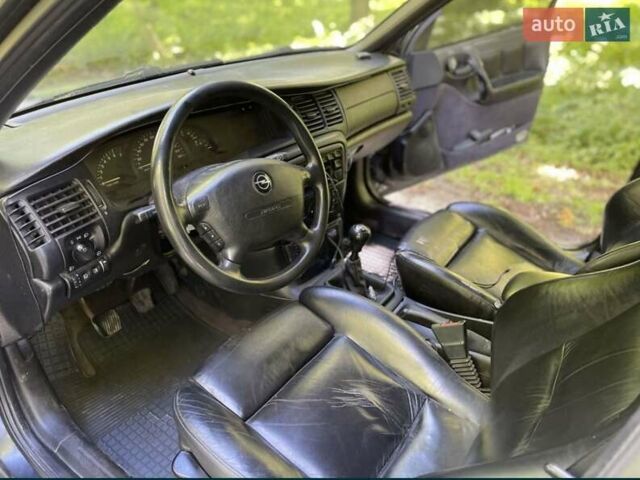 Черный Опель Вектра, объемом двигателя 1.6 л и пробегом 300 тыс. км за 1850 $, фото 12 на Automoto.ua