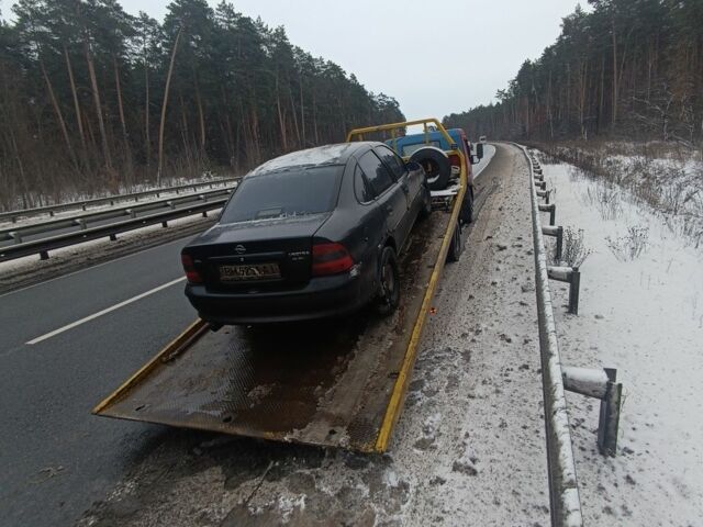 Черный Опель Вектра, объемом двигателя 1.8 л и пробегом 380 тыс. км за 1400 $, фото 1 на Automoto.ua