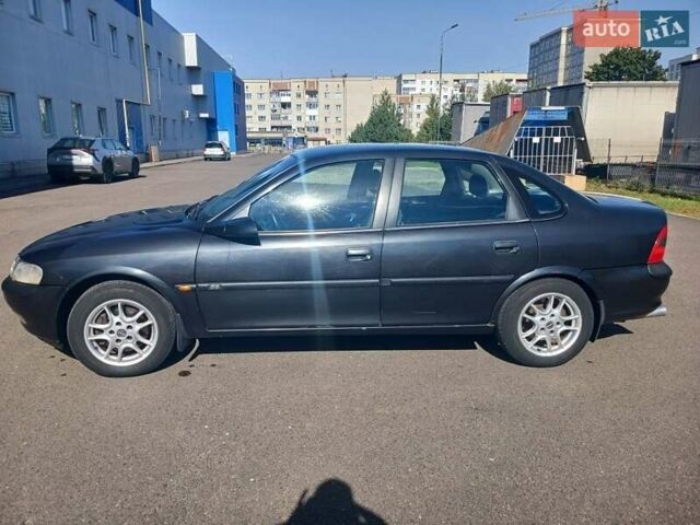 Чорний Опель Вектра, об'ємом двигуна 2 л та пробігом 274 тис. км за 2700 $, фото 1 на Automoto.ua