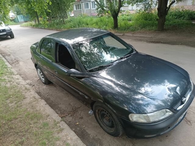 Черный Опель Вектра, объемом двигателя 1.8 л и пробегом 380 тыс. км за 1400 $, фото 9 на Automoto.ua
