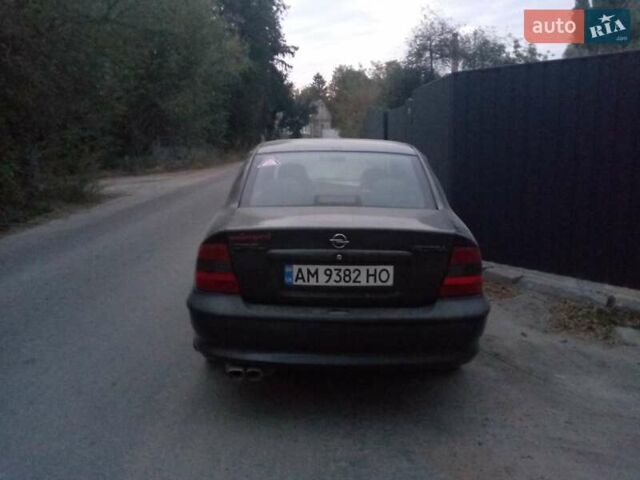 Черный Опель Вектра, объемом двигателя 2.5 л и пробегом 285 тыс. км за 1900 $, фото 1 на Automoto.ua