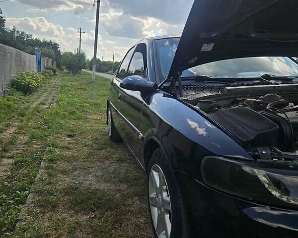 Чорний Опель Вектра, об'ємом двигуна 1.8 л та пробігом 333 тис. км за 3800 $, фото 15 на Automoto.ua