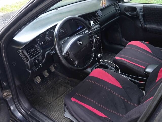 Черный Опель Вектра, объемом двигателя 2 л и пробегом 273 тыс. км за 2200 $, фото 3 на Automoto.ua